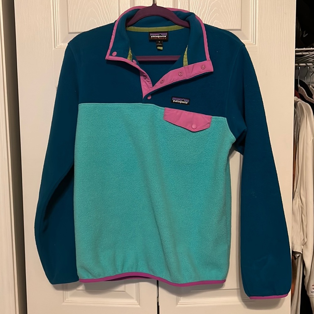 Lightly worn. Size medium but fits like a small. Snug fit.